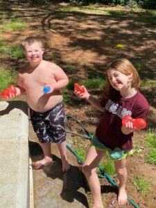 Sheran Kids playing with bunch o balloons